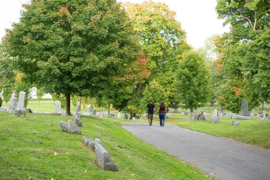 Couple walking a path through the grounds